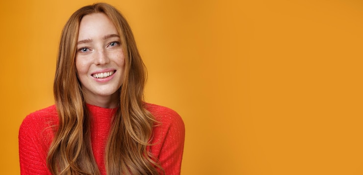 Zdarma Fotografie closeup shot of tender gentle and cute redhead cutie with long natural hairstyle smiling joyfully wi