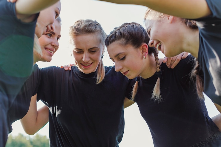 Zdarma Fotografie female soccer team gathering up