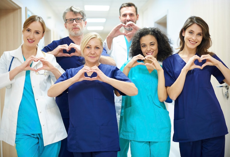 Zdarma Fotografie group of doctors with heart symbol