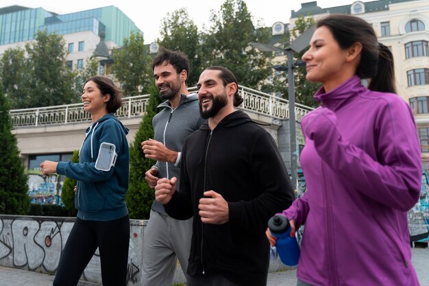medium shot latin people training outdoors