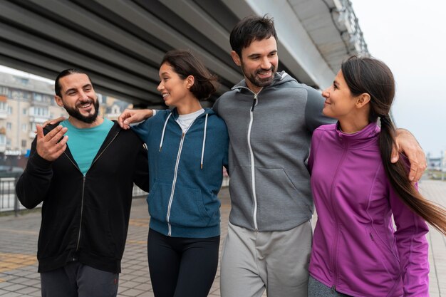 medium shot latin people training outdoors
