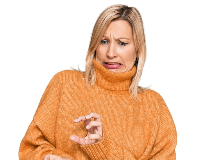 Zdarma Fotografie middle age caucasian woman wearing casual winter sweater disgusted expression displeased and fearful doing disgust face because aversion reaction