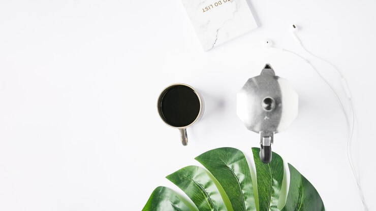 Zdarma Fotografie office desktop with a coffee cup