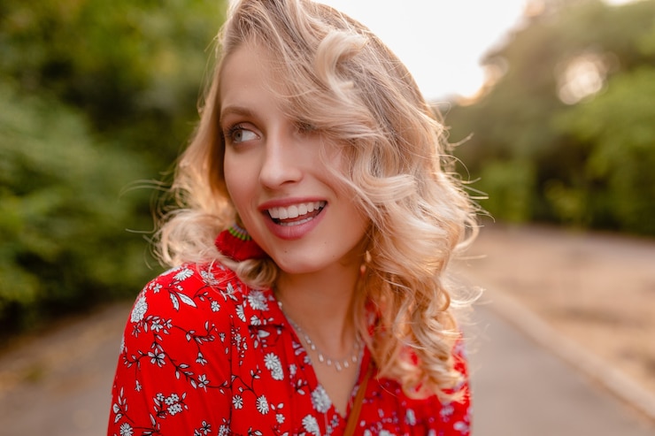 Zdarma Fotografie portrait of attractive stylish blond smiling woman in red blouse summer fashion outfit  wearing earrings smiling