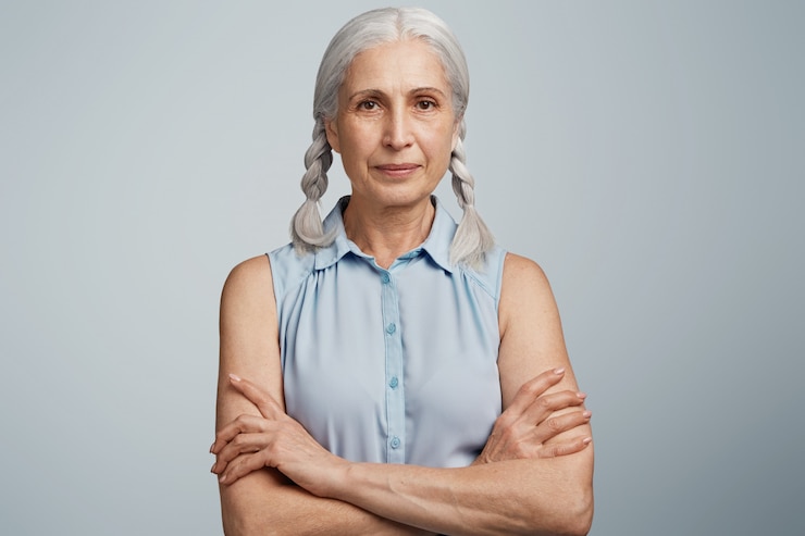 Zdarma Fotografie senior woman with pigtails dressed in blue blouse