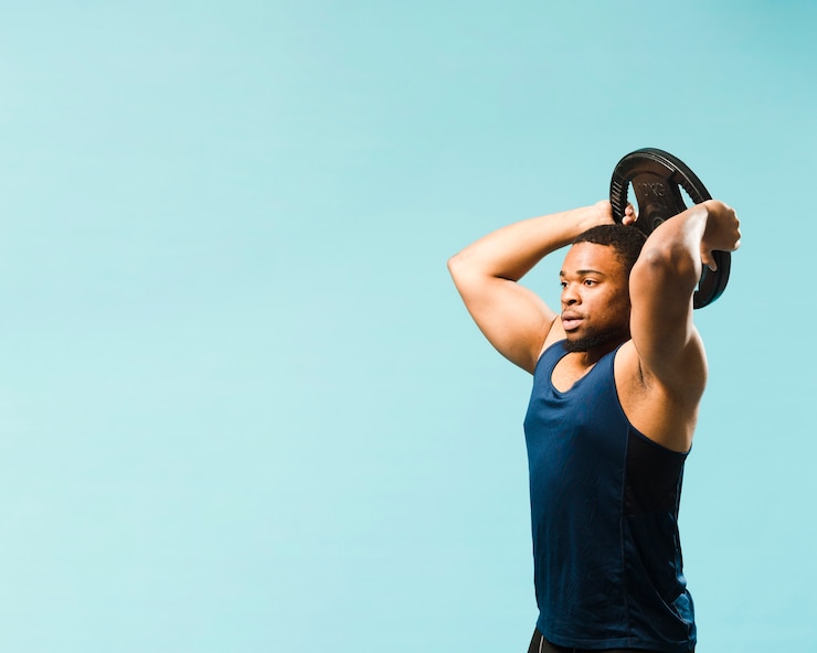 Zdarma Fotografie side view of athlete holding weights