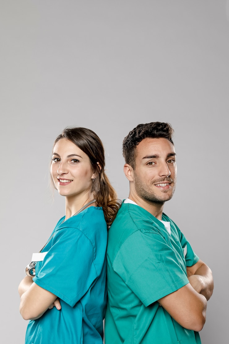 Zdarma Fotografie side view of smiley doctors posing
