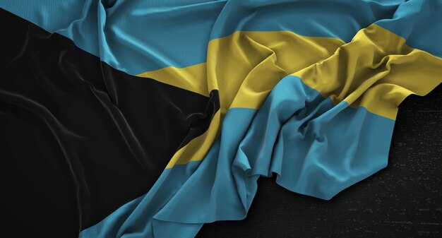 A bandeira das Bahamas enrugada no fundo escuro 3D Render