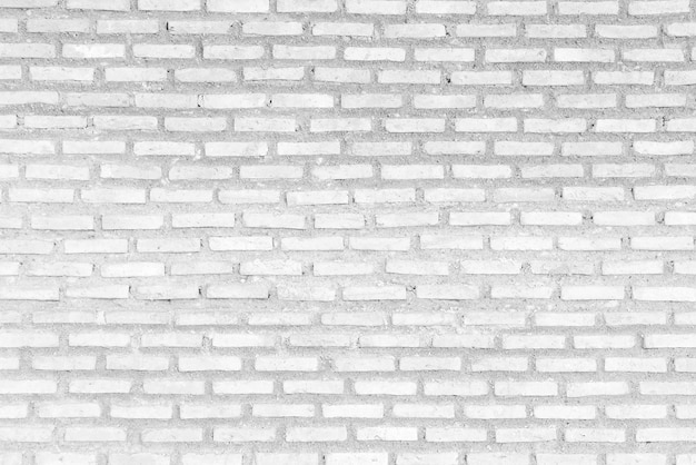 Abstract weathered texture white brick wall background