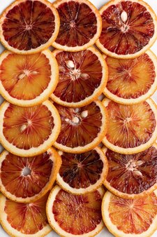 Abstrato com frutas cítricas de fatias de laranja padrão de frutas cítricas vermelhas alaranjadas closeup