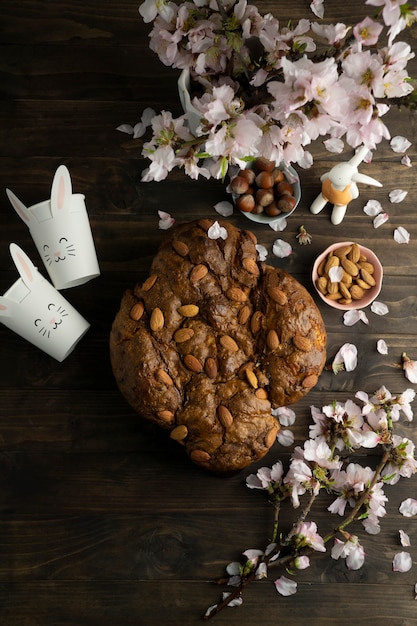 Foto grátis acima vista colomba com amêndoas e flores