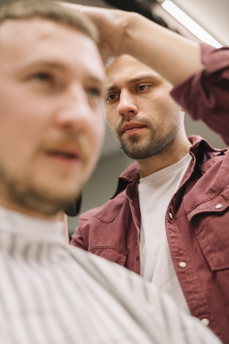Foto grátis ângulo baixo do conceito de barbearia