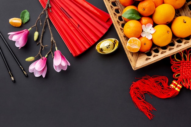 Ano novo chinês da cesta da magnólia e da tangerina