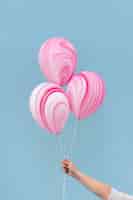 Foto grátis arranjo de balões rosa abstratos