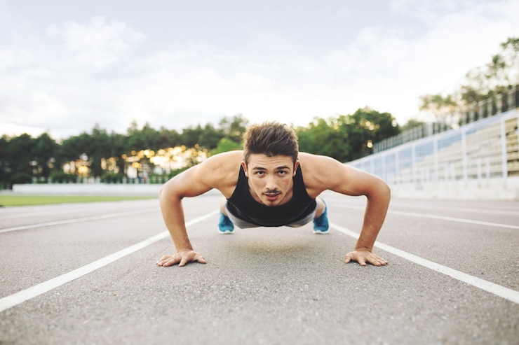 Foto grátis atleta fazendo flexões