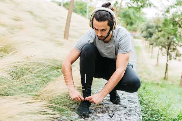 Atleta urbana, fixação de seus sapatos