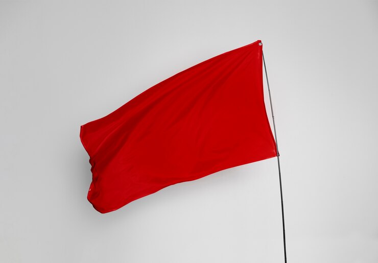 Foto grátis bandeira vermelha a agitar