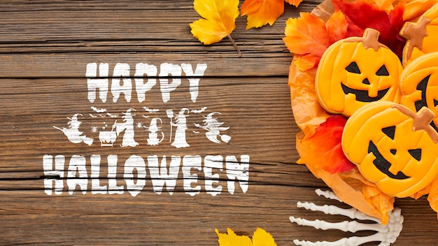 Foto grátis banner de halloween com doces e folhas