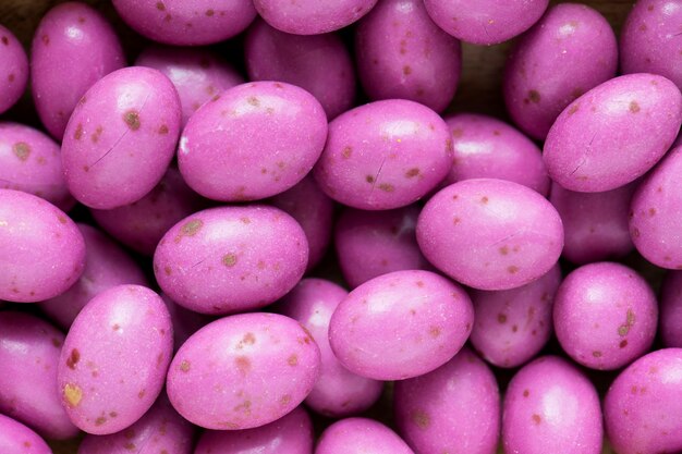 Bolas de feijão de pedra de ovo chocolate texturizado fundo