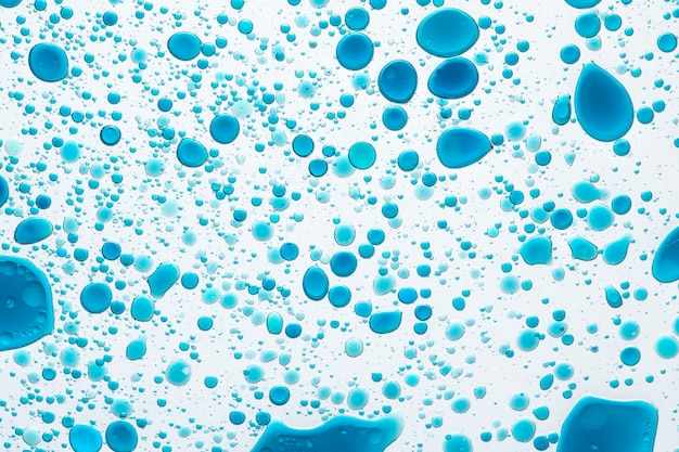 Bolha de óleo de fundo abstrato azul em papel de parede de água