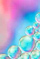 Foto grátis bolhas de ar colorido abstrato na água no fundo desfocado saturado