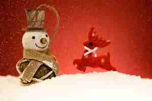 Foto grátis boneco de neve e renas