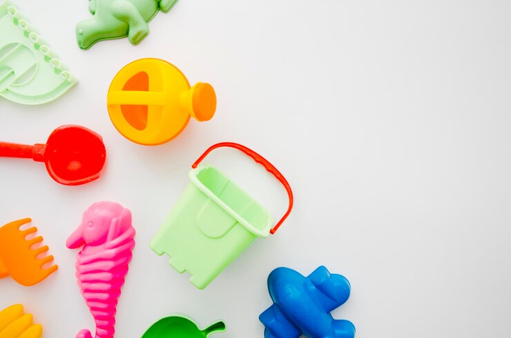 Foto grátis brinquedos de praia planos para crianças
