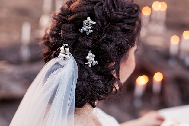 Foto grátis cabelo da noiva do casamento amarrado.