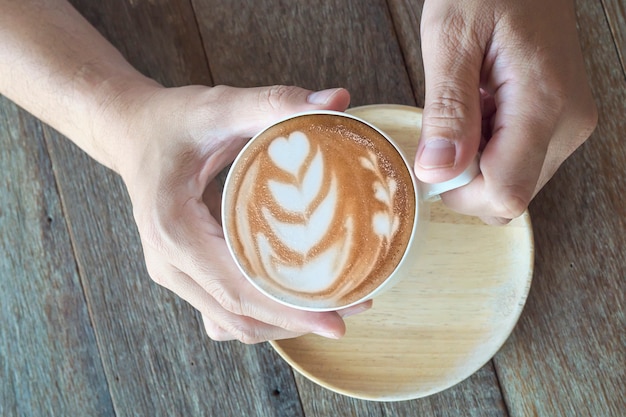 Café com decoração latte art