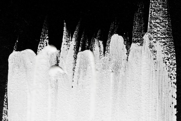 Foto grátis camada plana de pinceladas monocromáticas na superfície