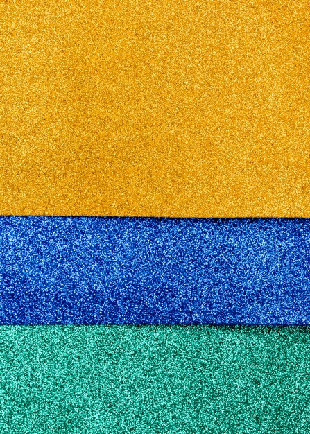 Camadas multicoloridas de glitter com espaço de cópia