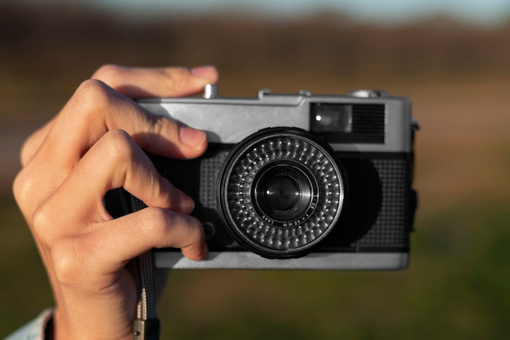 Foto grátis câmera fotográfica de mão