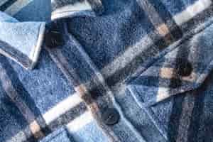 Foto grátis camisa xadrez azul textural quente de outono closeup