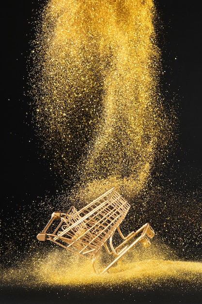 Carrinho de compras dourado com glitter dourado