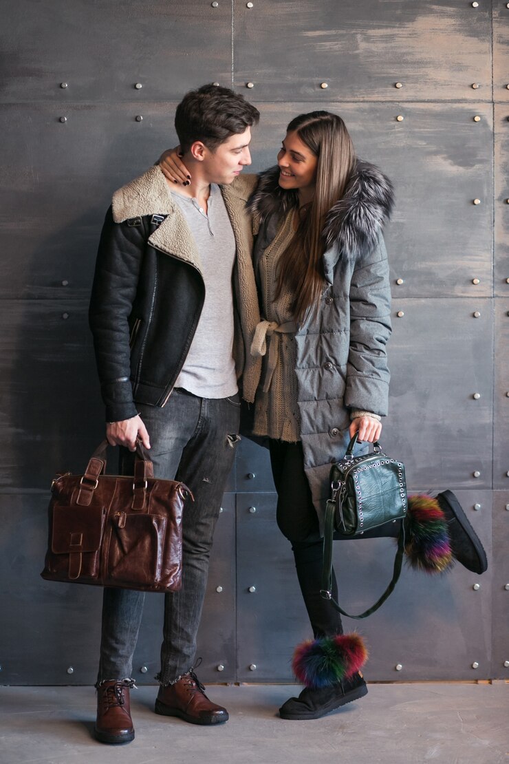 Foto grátis casal de roupas de inverno no estúdio