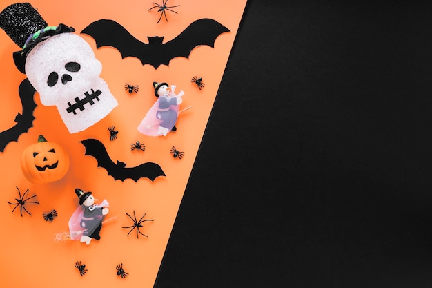 Foto grátis caveira de desenho e morcegos com abóboras