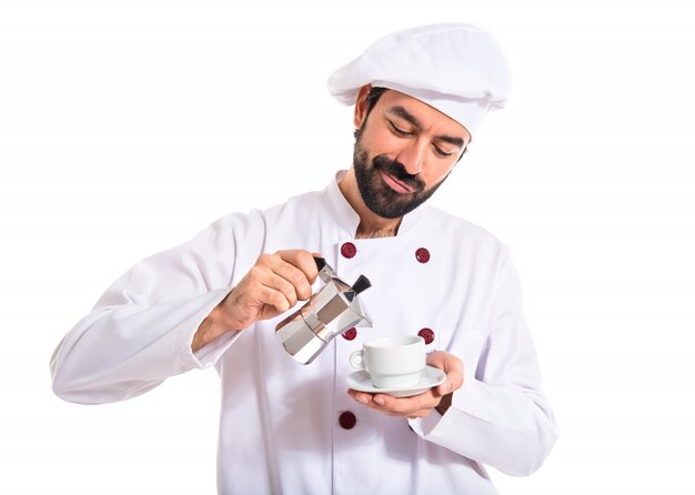 Chef segurando uma xícara de café sobre fundo branco