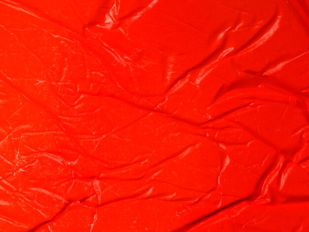 Close-up amassado fundo de papel vermelho