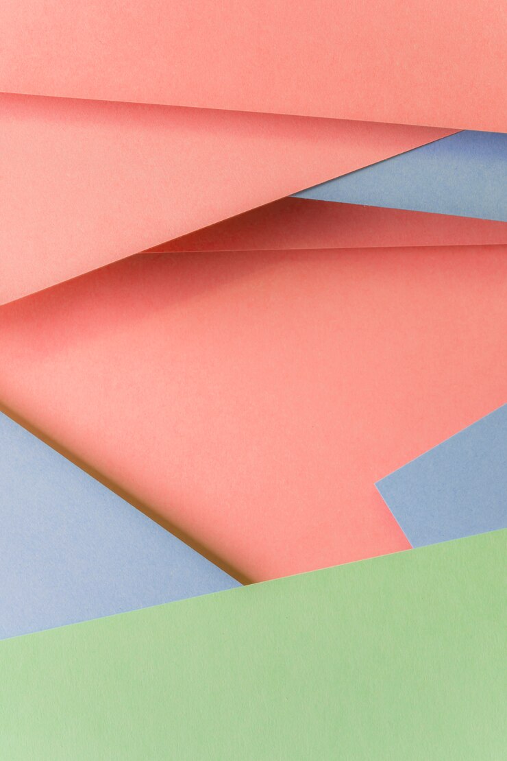 Foto grátis close-up de pano de fundo elegante papel colorido pastel