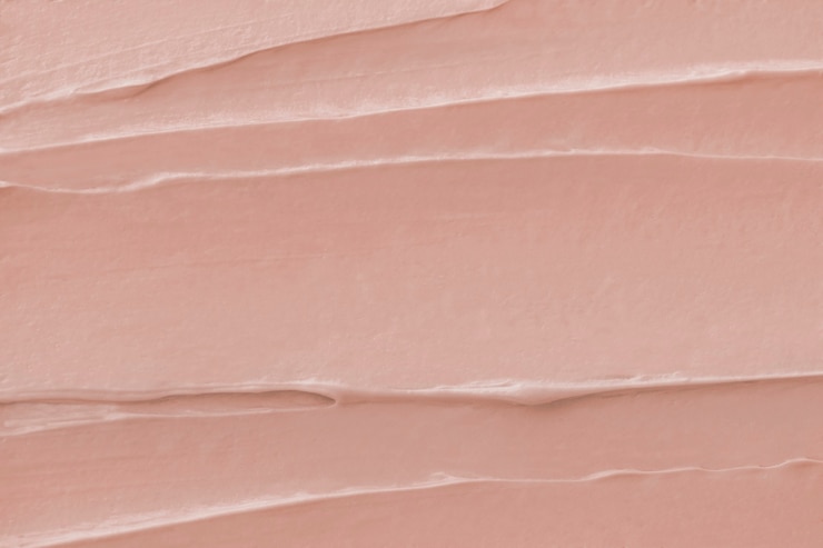 Foto grátis close-up de textura de glacê rosa