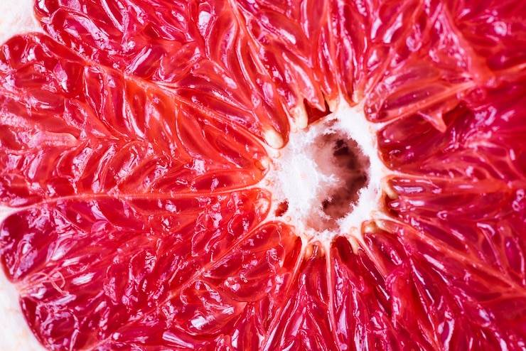 Foto grátis close-up de toranja madura suculenta