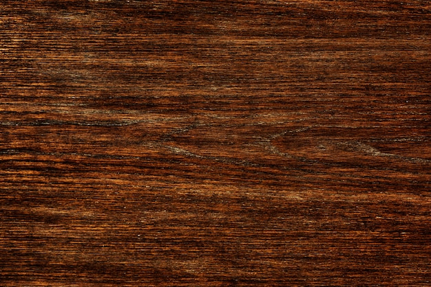 Close-up de um fundo texturizado de tábua de madeira marrom