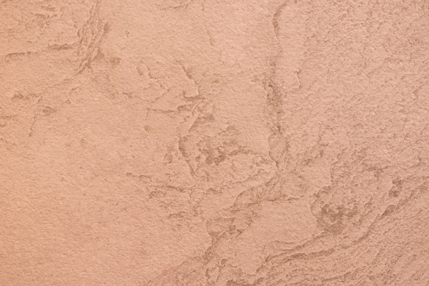 Foto grátis close-up de uma textura de parede áspera laranja