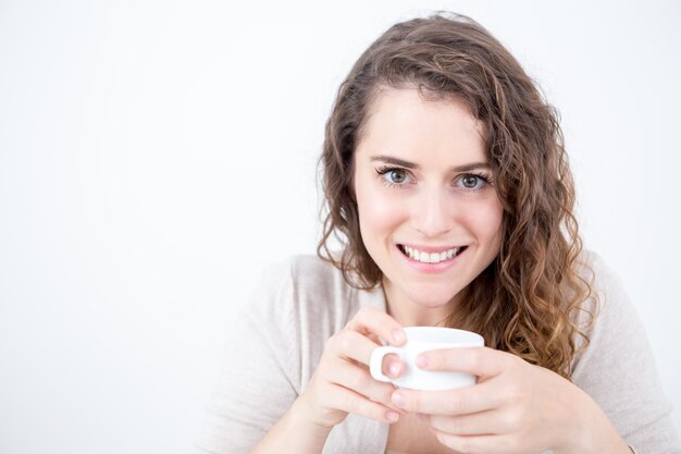 Closeup of Beautiful Woman Drinking Tea