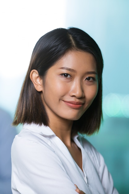 Closeup Portrait of Content Nice Young Asian Woman