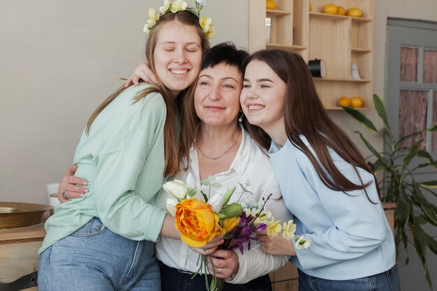 Clube social feminino segurando flores e abraços