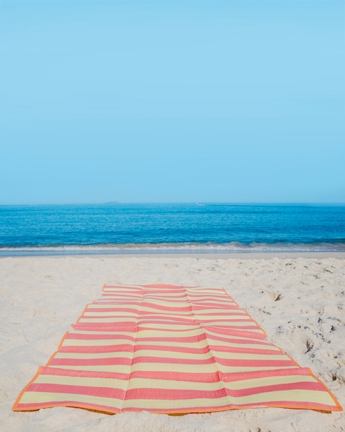 Cobertor de praia em areia