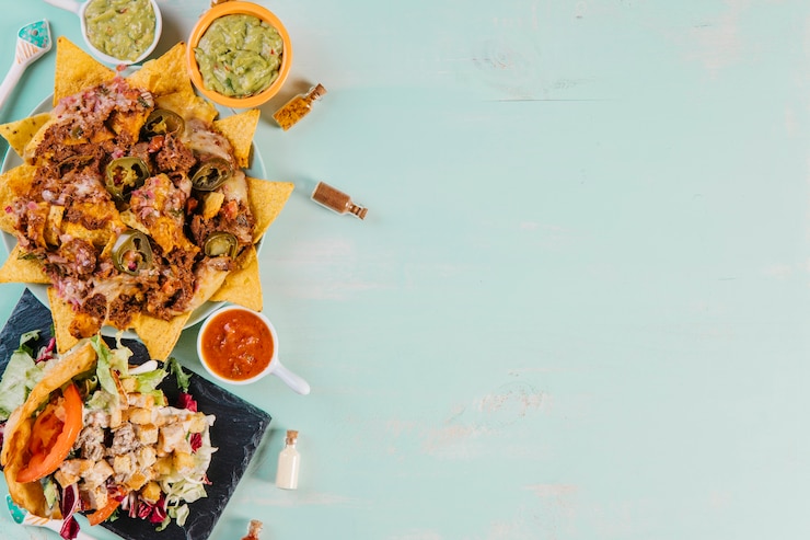 Foto grátis comida mexicana no lado esquerdo do fundo