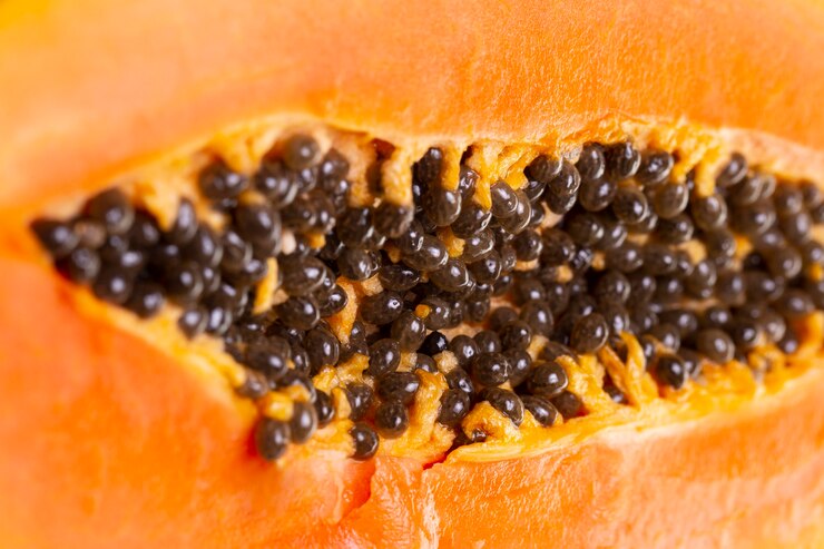 Foto grátis composição da deliciosa papaia exótica