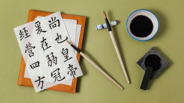 Foto grátis composição da vista superior de elementos chineses com tinta